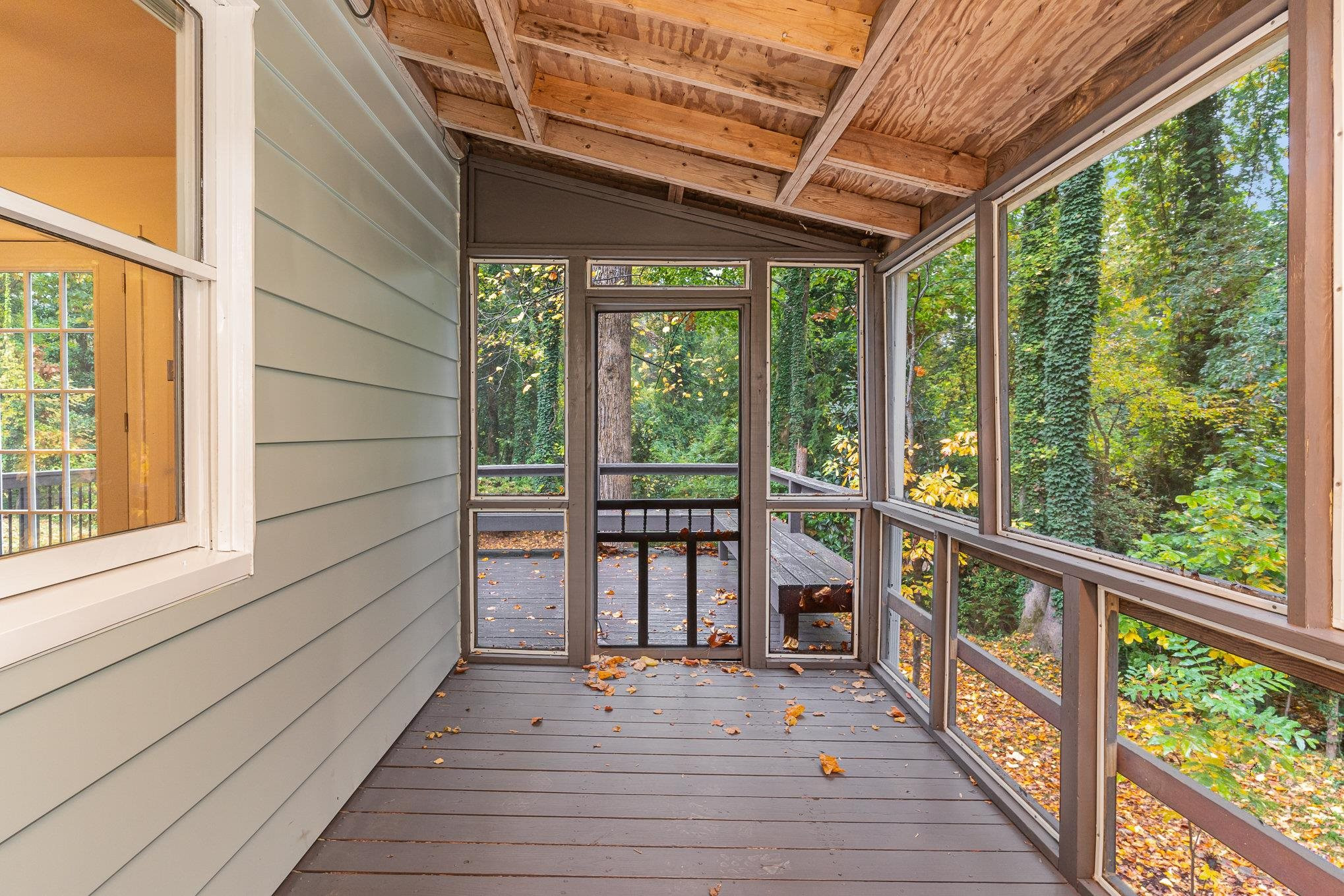 2811 Gordon Street Raleigh, NC 27608 - Photo 9 of 33 a view of a balcony with wooden floor