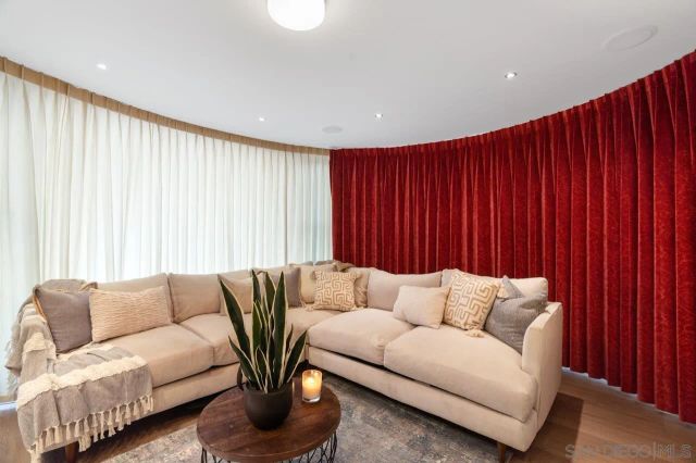 a living room with furniture and a couch