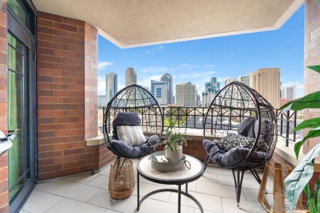 a view of city with tall buildings