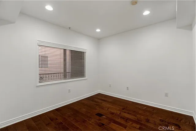 a bathroom with a shower and a glass door