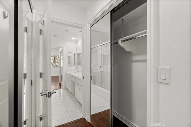 wooden floor with white walls