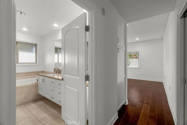 a view of a bathroom with a glass door and shower
