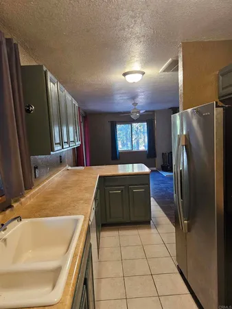 a bathroom with a tub sink and a mirror