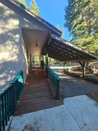 a view of street with wooden deck