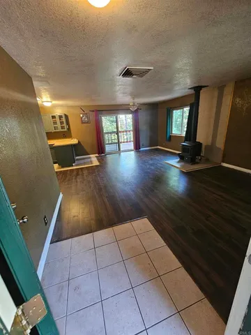 a view of a livingroom with a fireplace