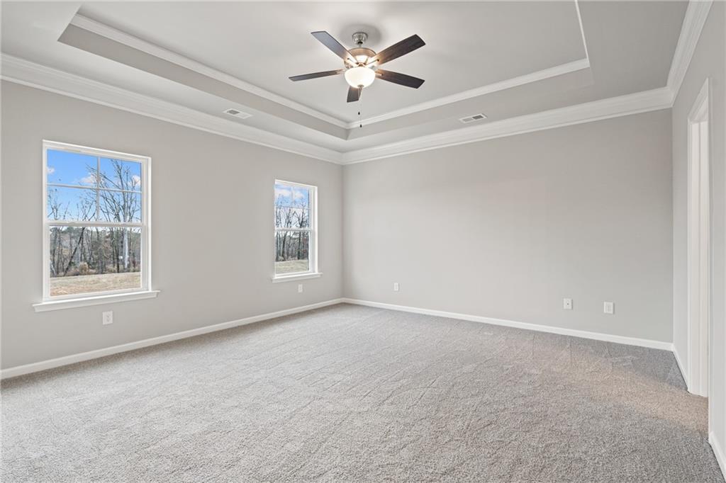 5571 Overview Drive Flowery Branch, GA 30542 - Photo 31 of 38 a view of an empty room with a window