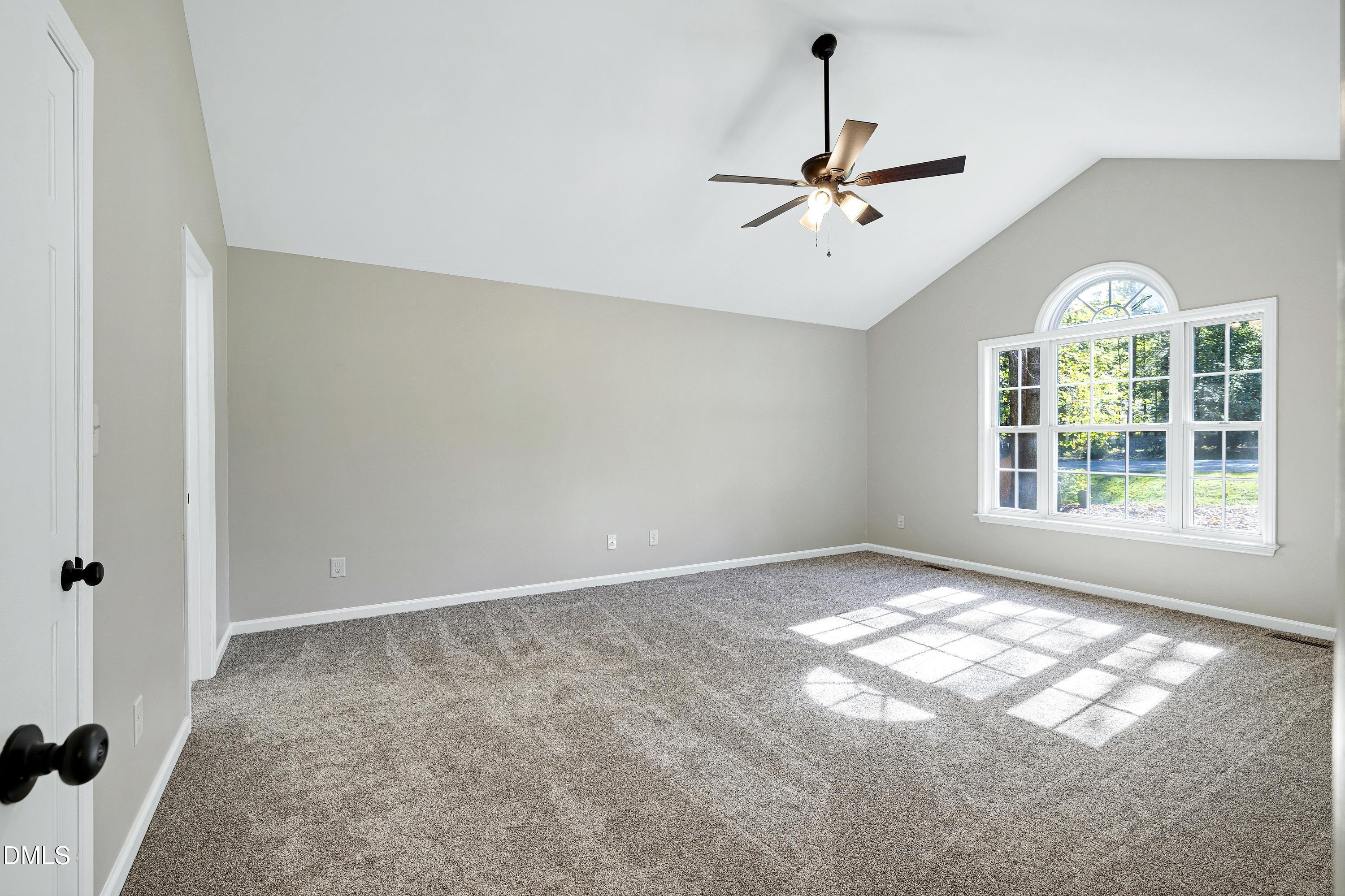 1508 Middle Ridge Drive Willow Spring, NC 27592 - Photo 19 of 56 a view of an empty room with a window