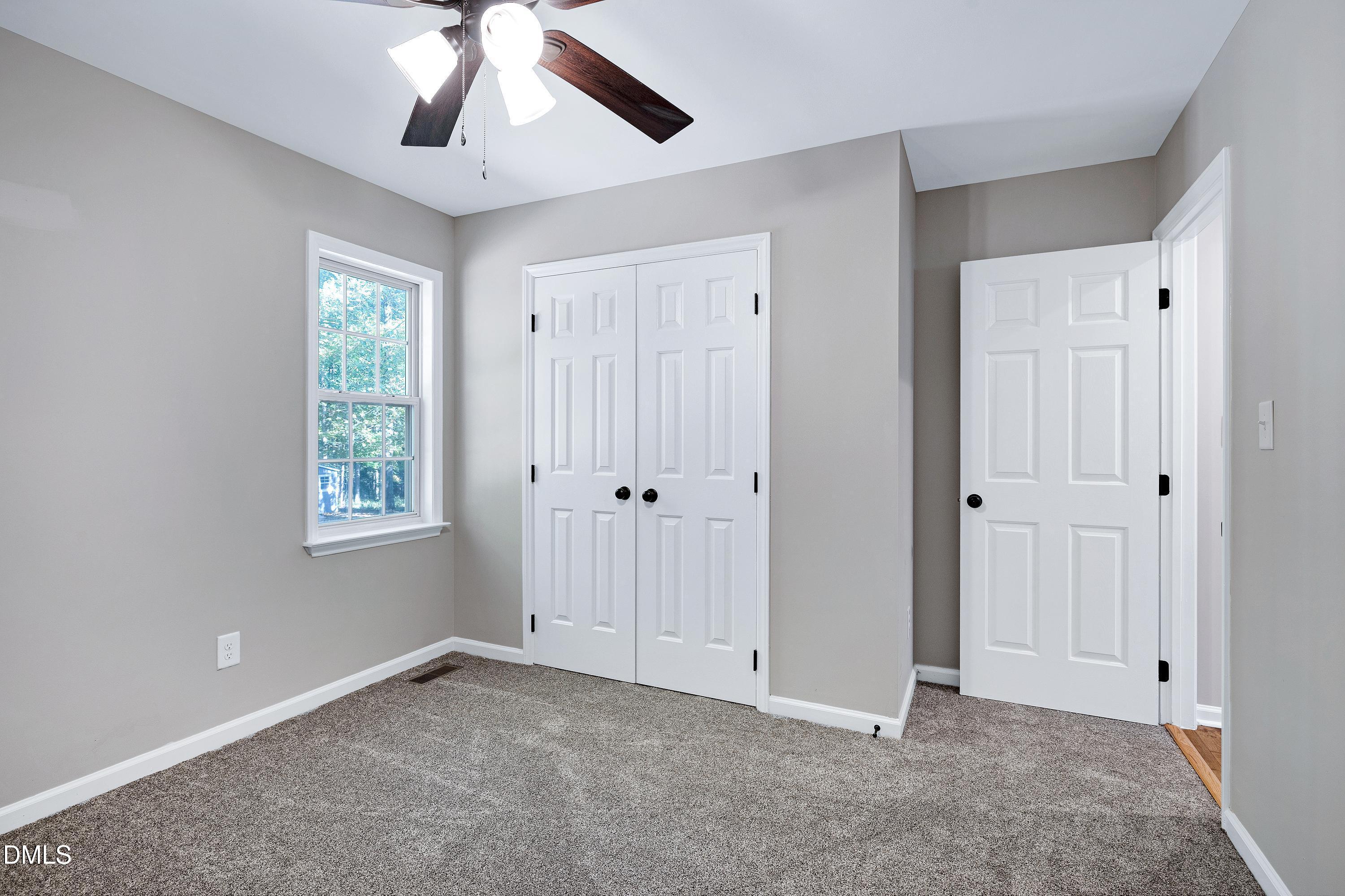 1508 Middle Ridge Drive Willow Spring, NC 27592 - Photo 29 of 56 a view of an empty room with a window
