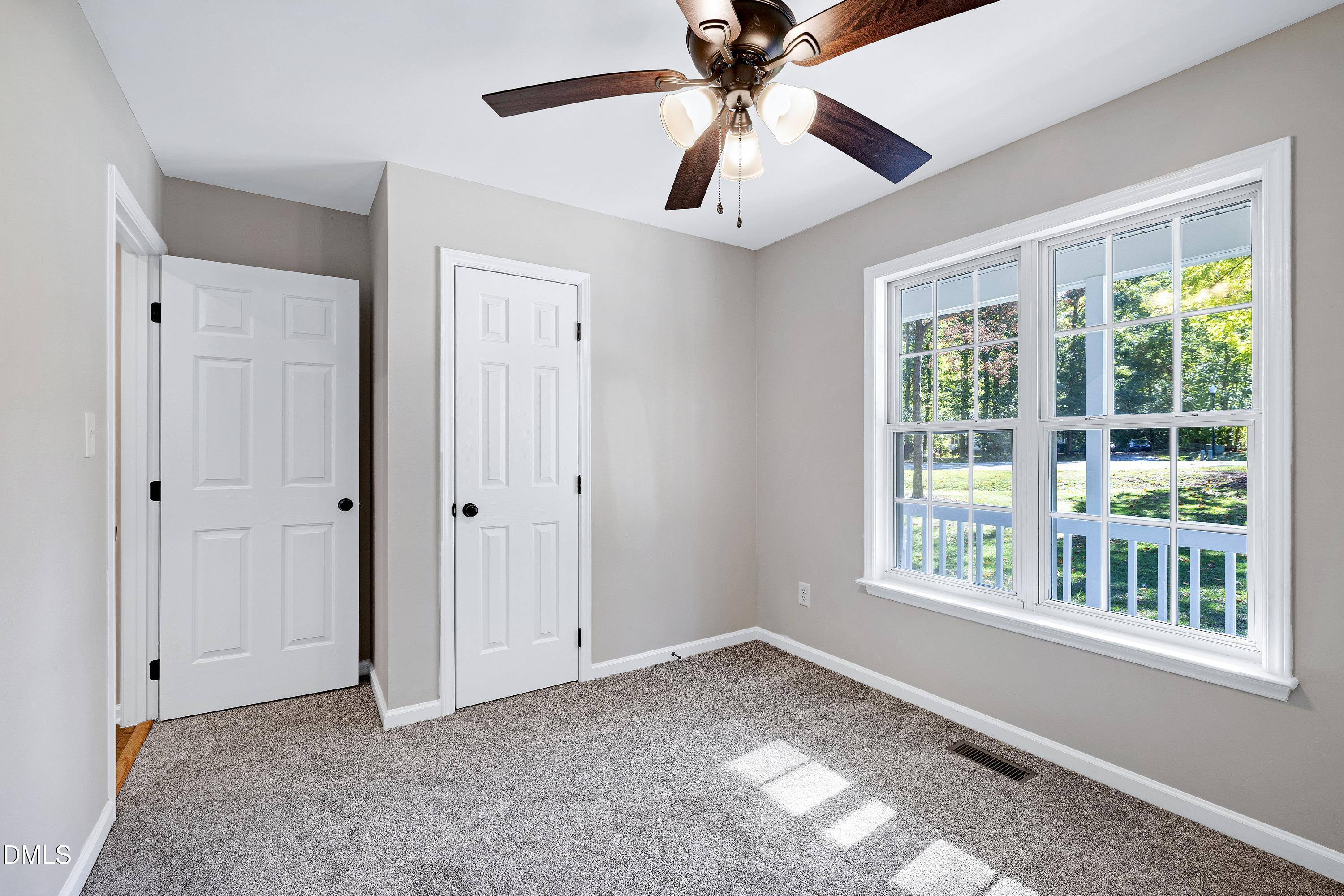 1508 Middle Ridge Drive Willow Spring, NC 27592 - Photo 32 of 56 a view of an empty room with a window