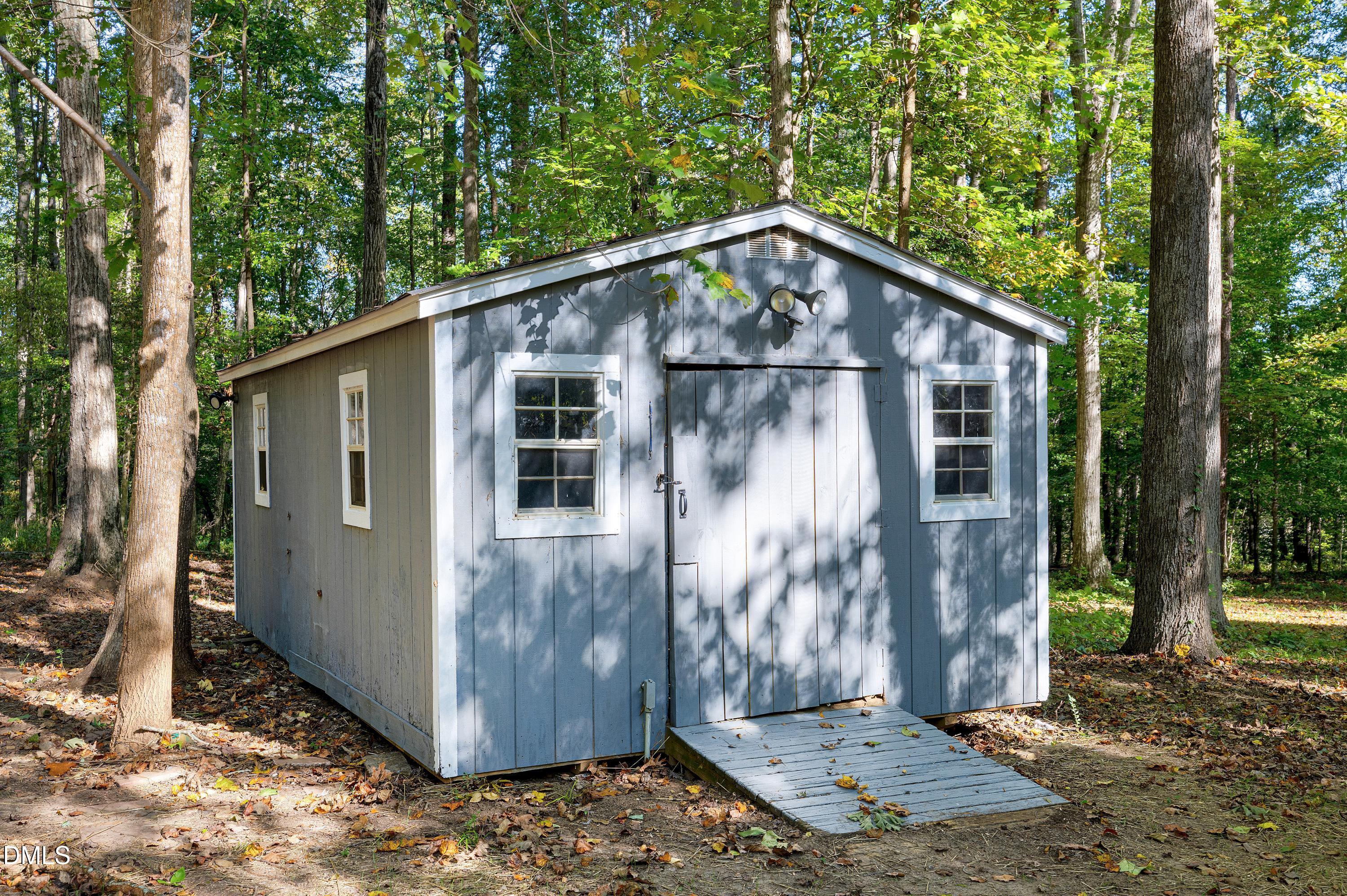1508 Middle Ridge Drive Willow Spring, NC 27592 - Photo 38 of 56 a view of a small house