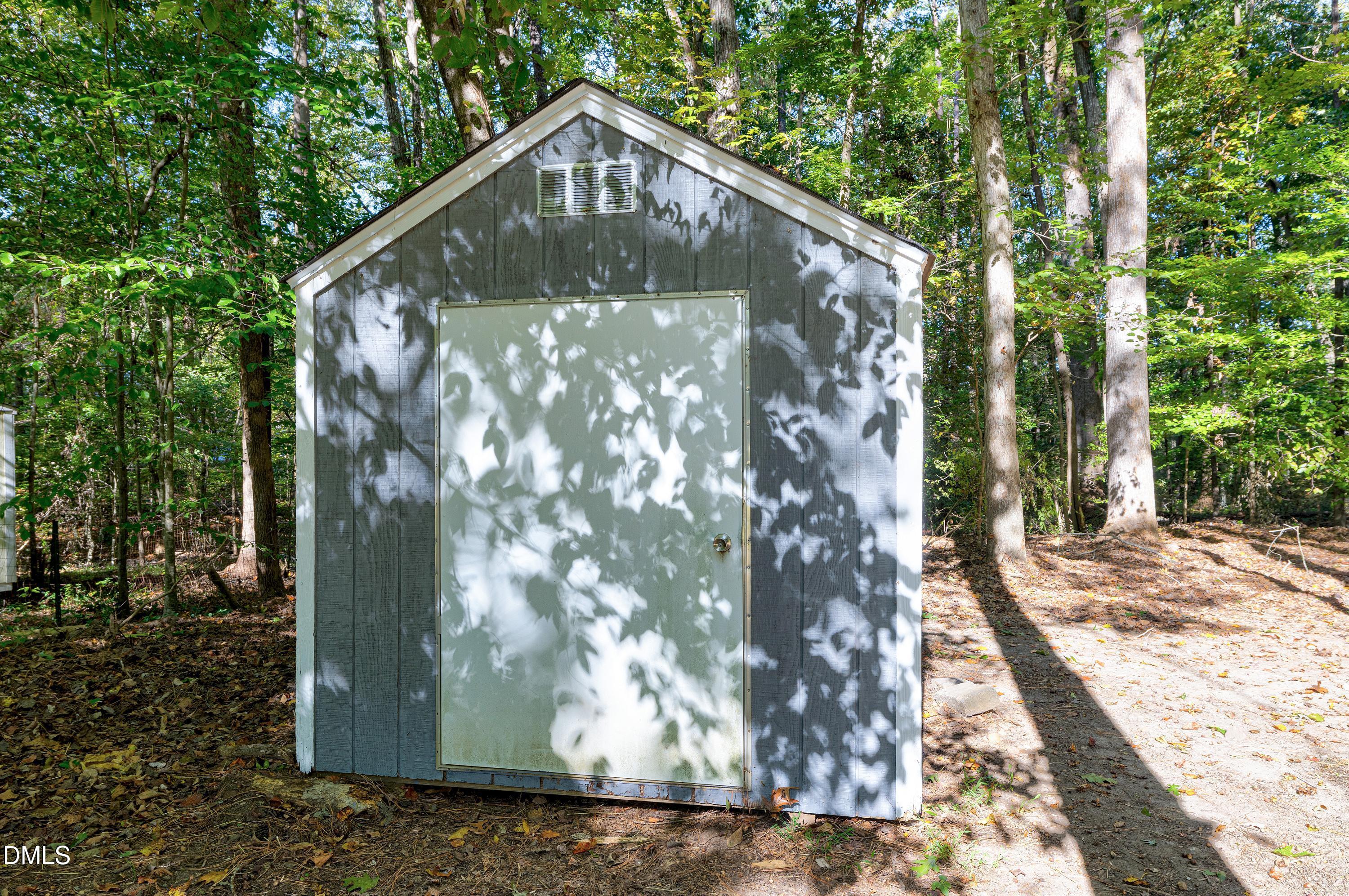 1508 Middle Ridge Drive Willow Spring, NC 27592 - Photo 39 of 56 a front view of a house