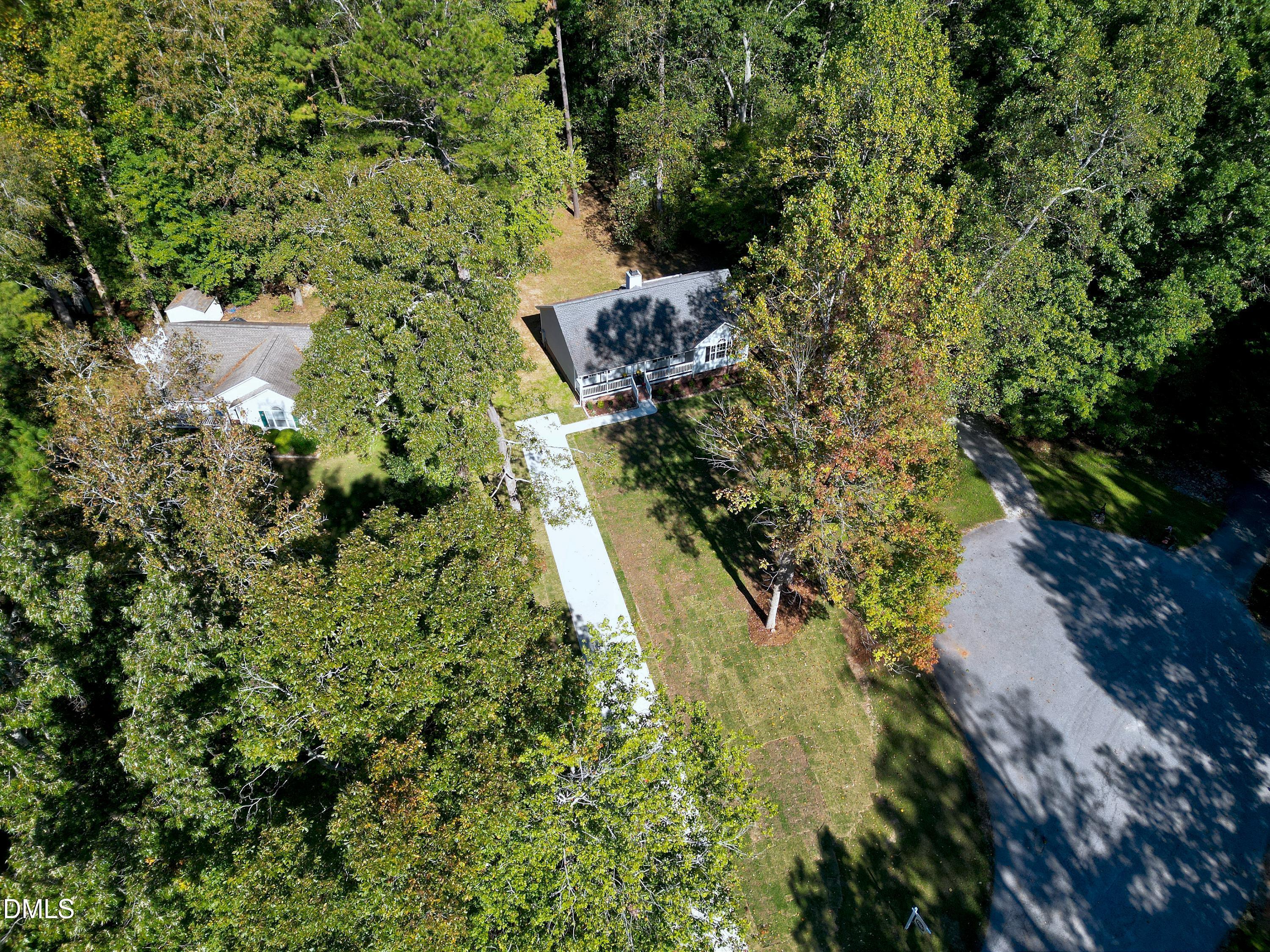 1508 Middle Ridge Drive Willow Spring, NC 27592 - Photo 43 of 56 a view of a tree with a yard