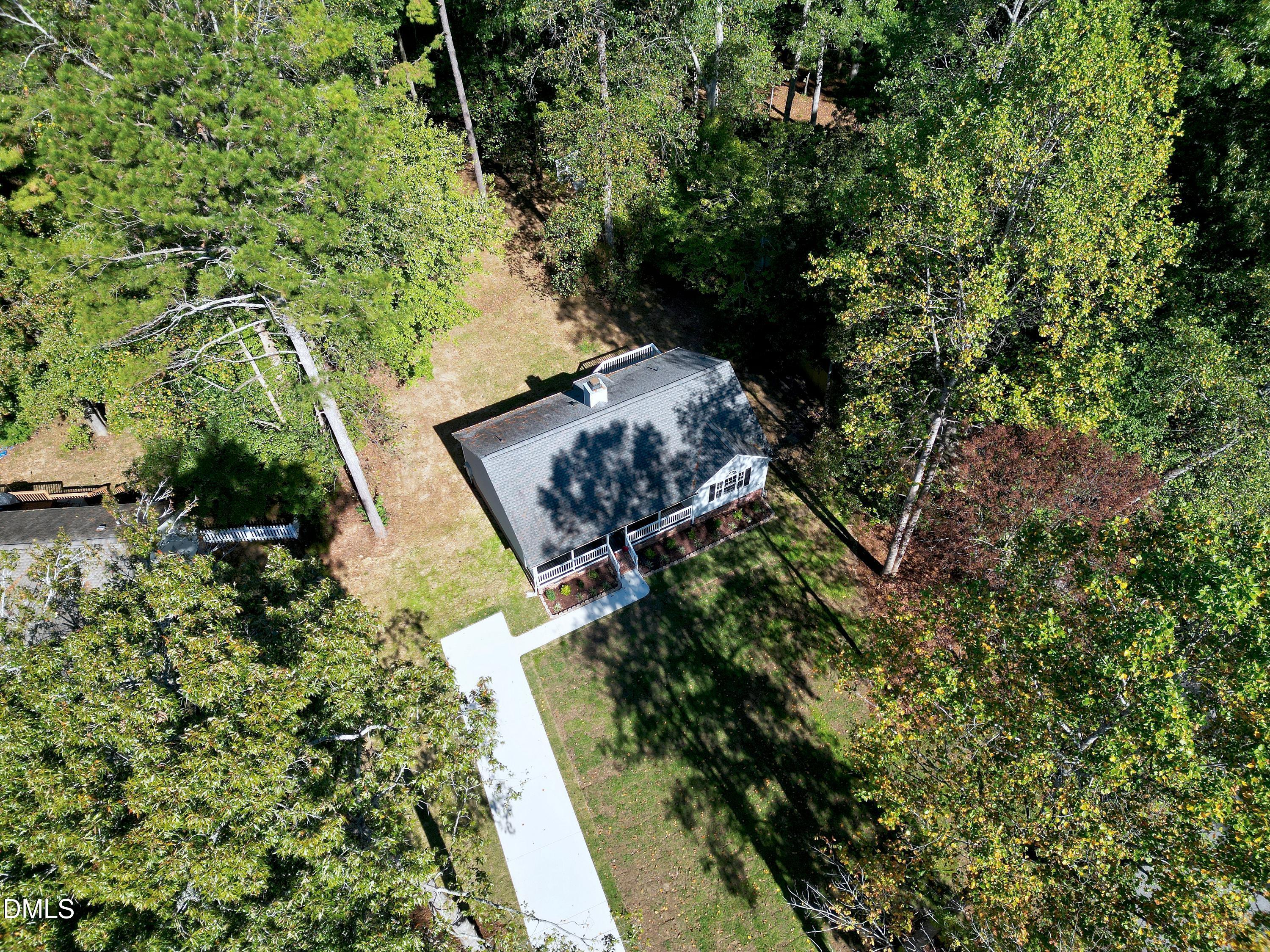 1508 Middle Ridge Drive Willow Spring, NC 27592 - Photo 44 of 56 an aerial view of a house with a yard