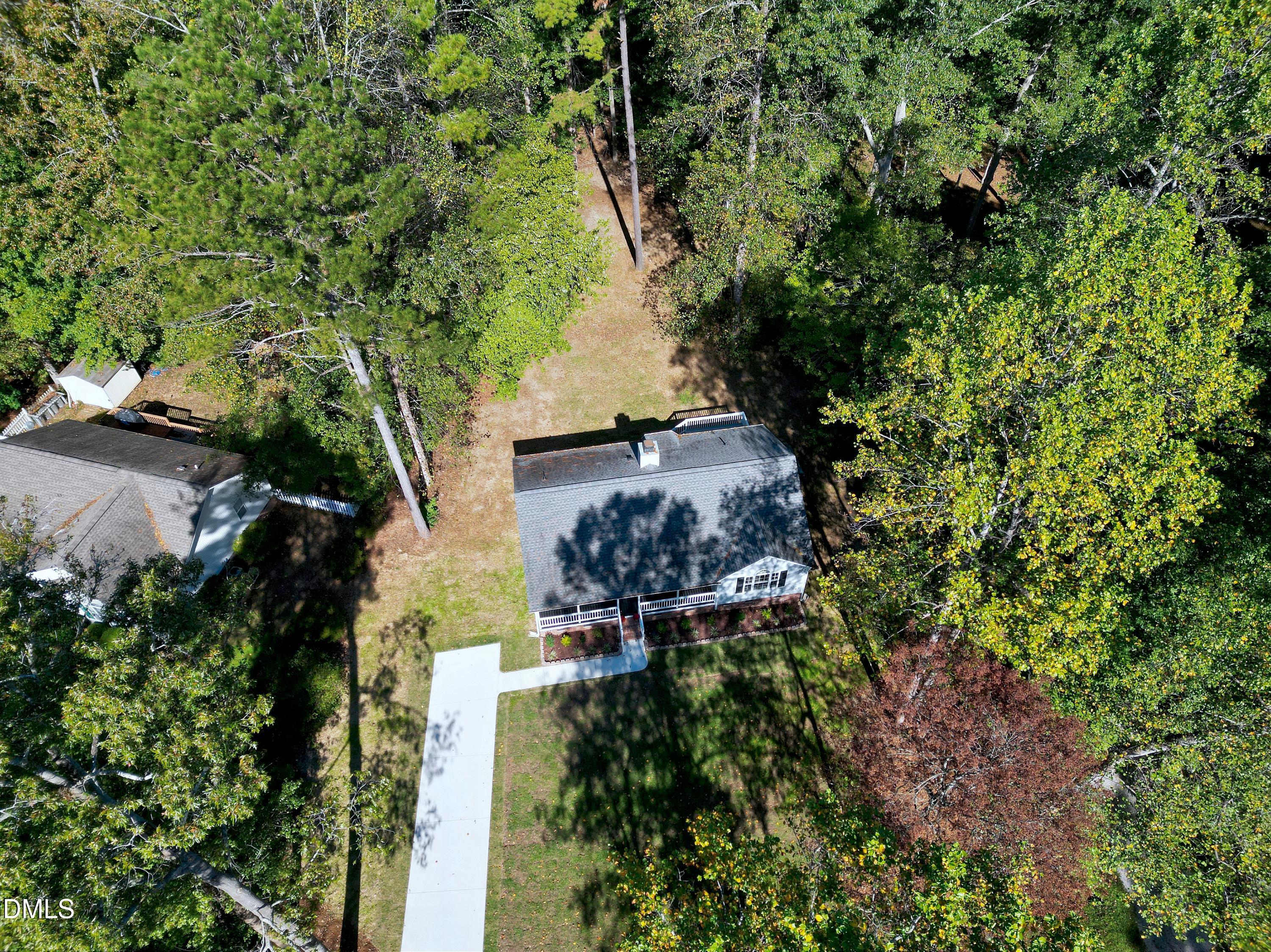 1508 Middle Ridge Drive Willow Spring, NC 27592 - Photo 45 of 56 an aerial view of a house with a yard