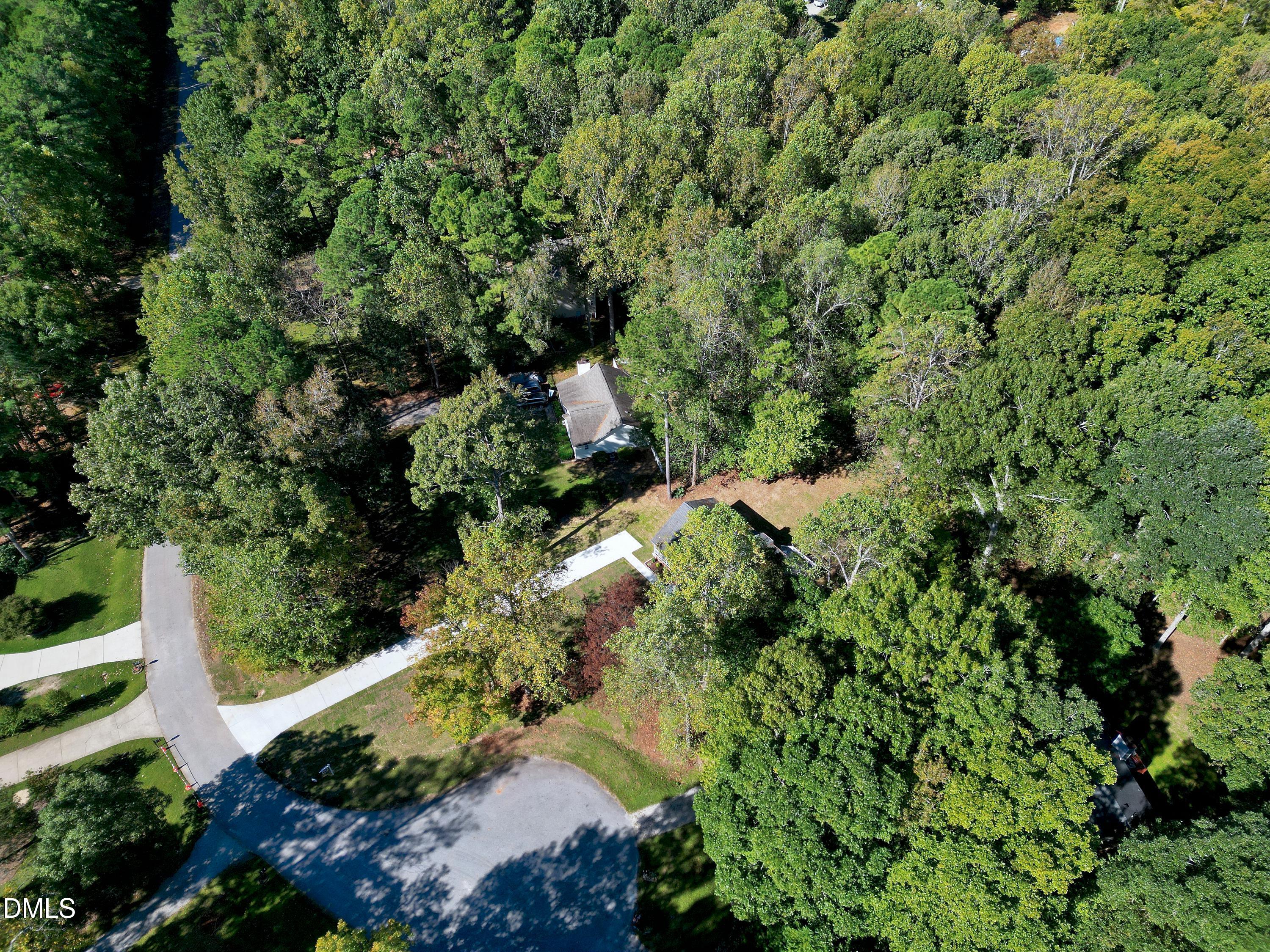 1508 Middle Ridge Drive Willow Spring, NC 27592 - Photo 46 of 56 a view of a garden with plants