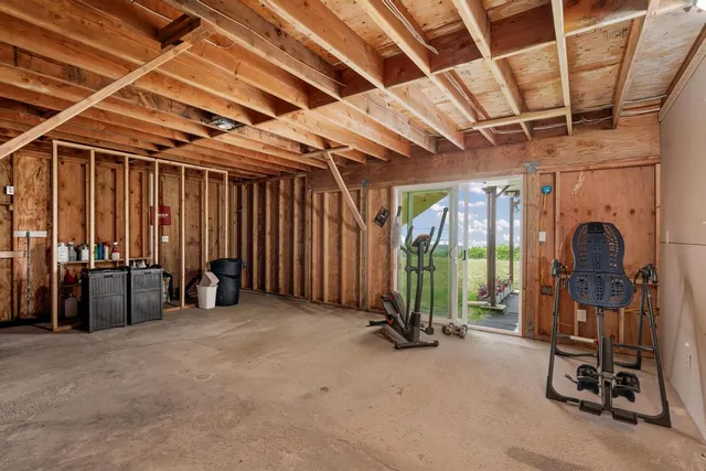 a view of a livingroom and a garage