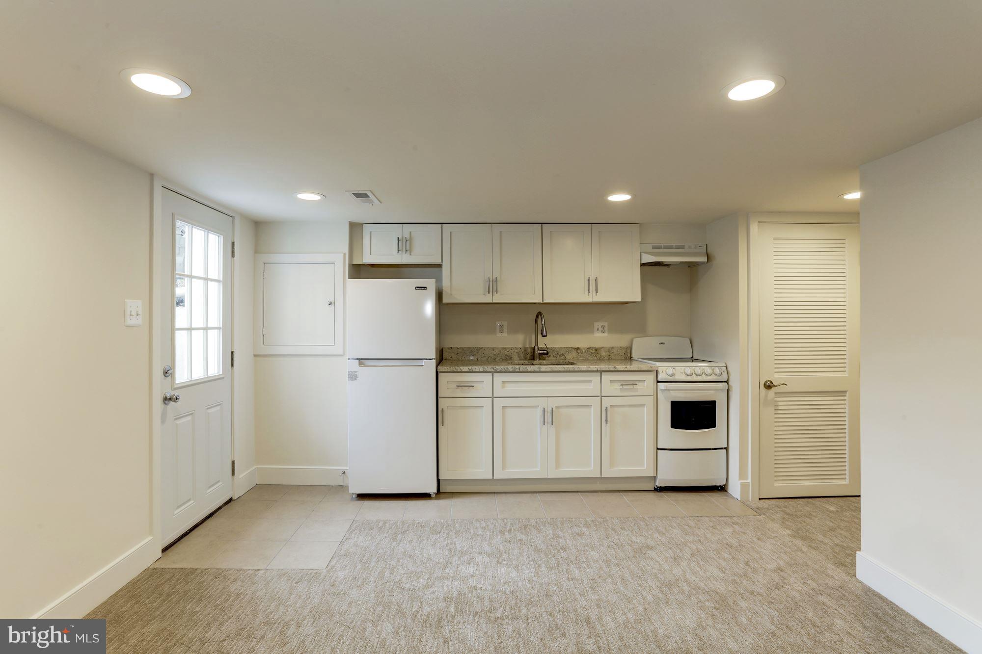 2406 3rd Street Northeast Washington, DC 20002 - Photo 27 of 30 Lower Level Living and Kitchen Area