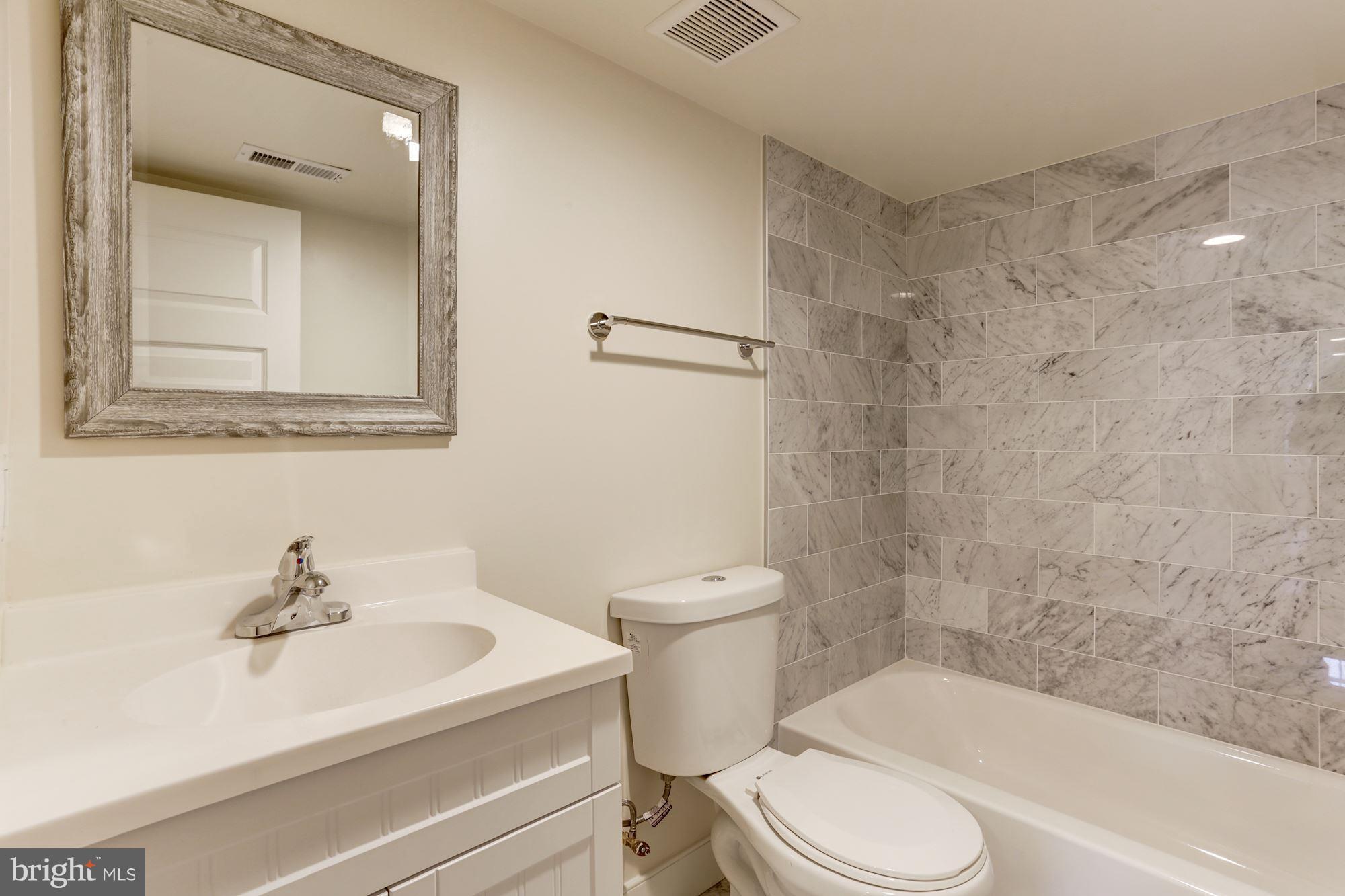 2406 3rd Street Northeast Washington, DC 20002 - Photo 28 of 30 Lower Level Marbled Bath
