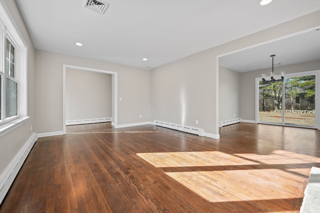 837 Main Road Westport, MA 02790 - Photo 10 of 18 a view of a room with wooden floor and window