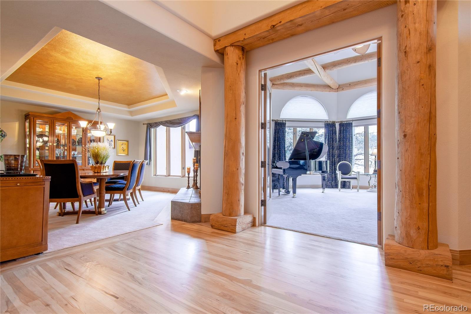 974 Spring Ranch Drive Golden, CO 80401 - Photo 13 of 35 a view of a livingroom and dining room with wooden floor