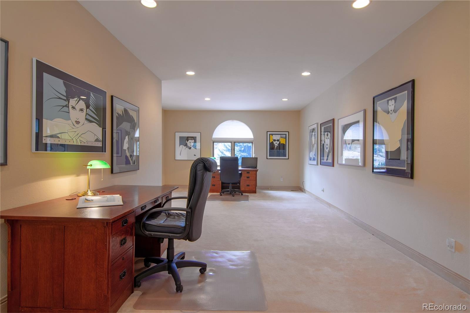 974 Spring Ranch Drive Golden, CO 80401 - Photo 23 of 35 a living room with furniture and a large window