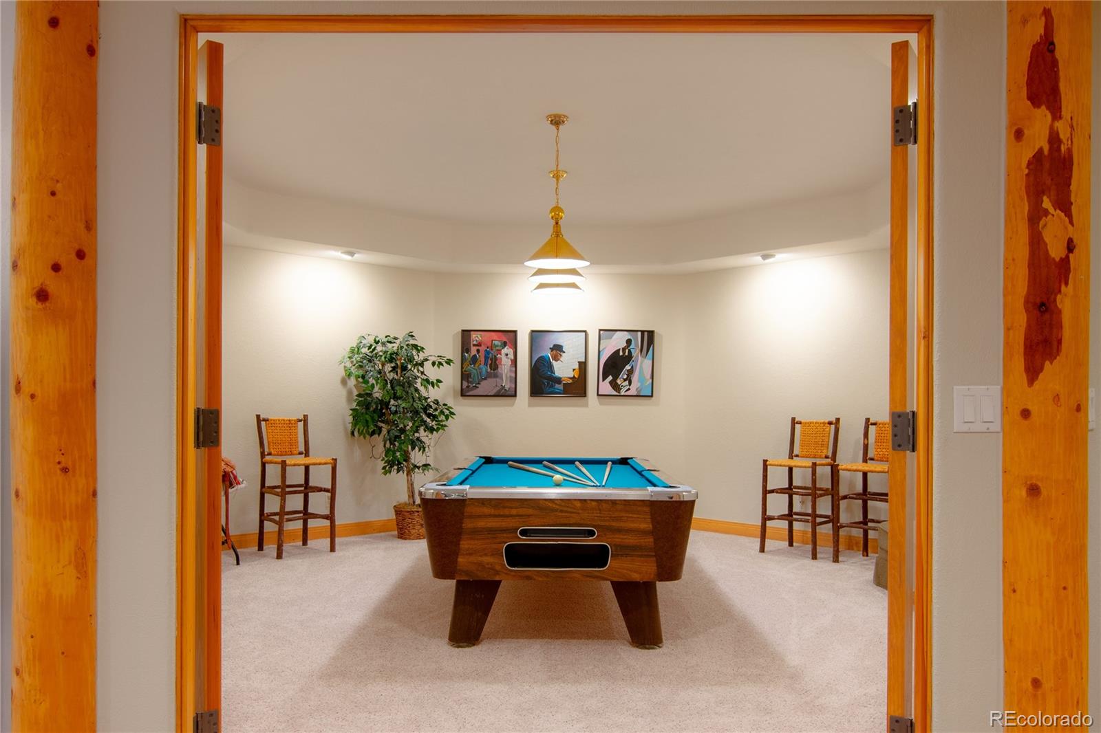 974 Spring Ranch Drive Golden, CO 80401 - Photo 27 of 35 a room with furniture and window