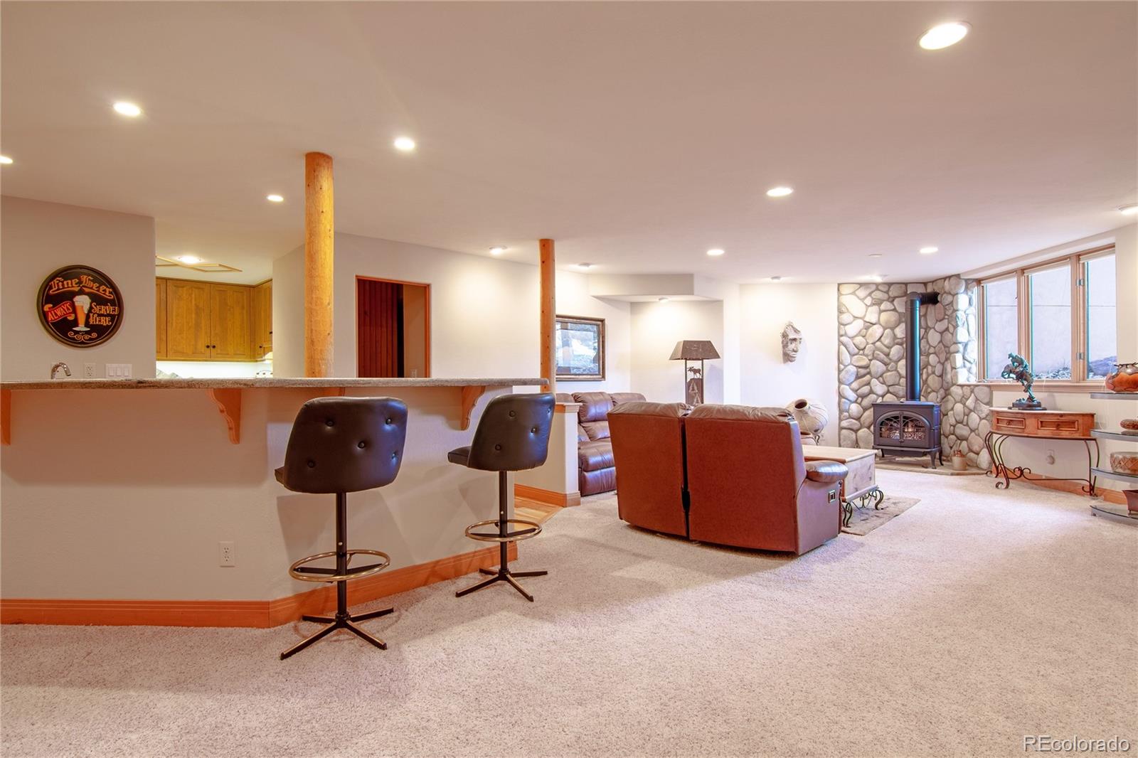 974 Spring Ranch Drive Golden, CO 80401 - Photo 28 of 35 a living room with furniture kitchen and a table
