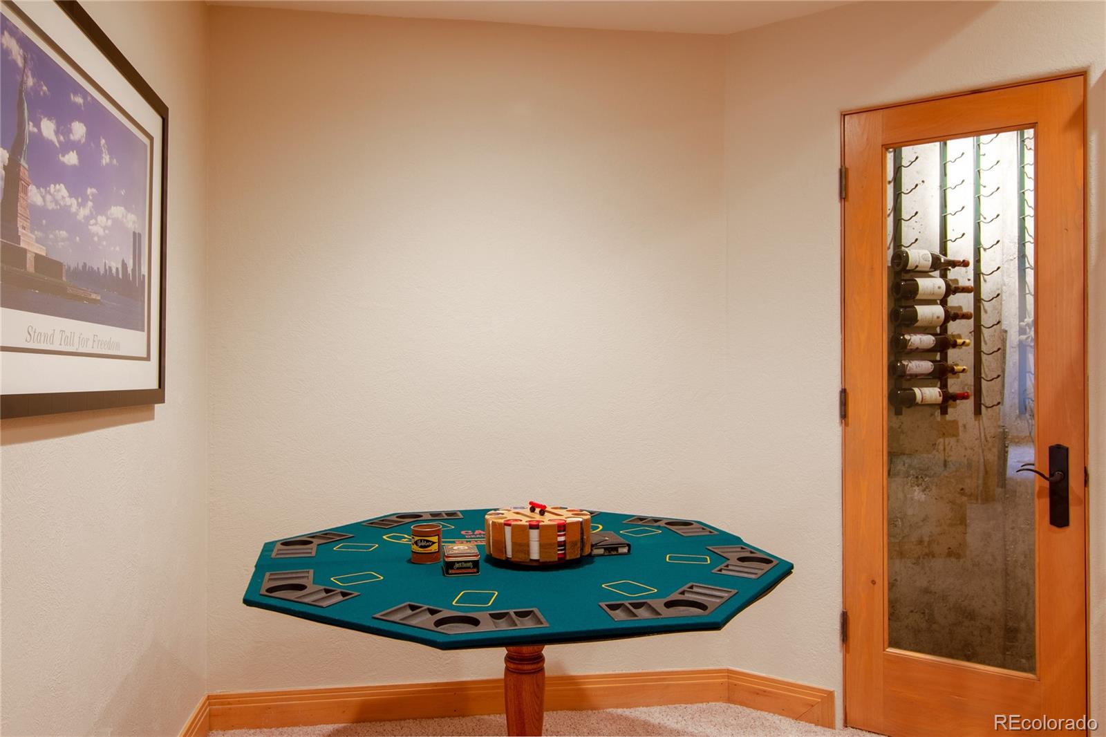 974 Spring Ranch Drive Golden, CO 80401 - Photo 29 of 35 a room with a table and chairs