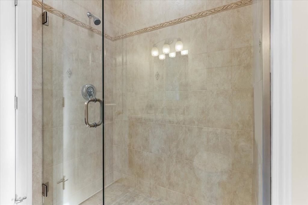 11 Shirley Road Needham, MA 02494 - Photo 11 of 41 a bathroom with a shower