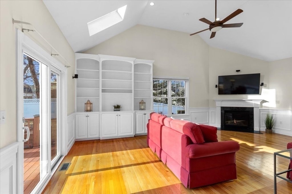 11 Shirley Road Needham, MA 02494 - Photo 15 of 41 a living room with furniture fireplace and a flat screen tv