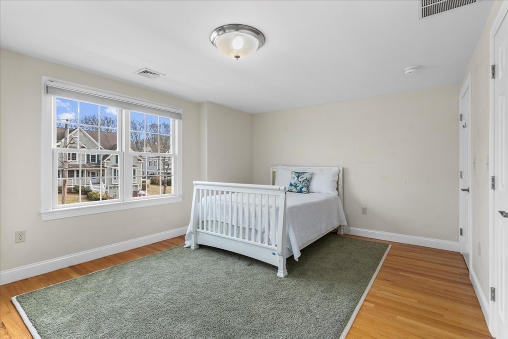11 Shirley Road Needham, MA 02494 - Photo 20 of 41 a bedroom with a bed and a window