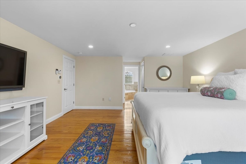 11 Shirley Road Needham, MA 02494 - Photo 26 of 41 a bed room with a bed and a television