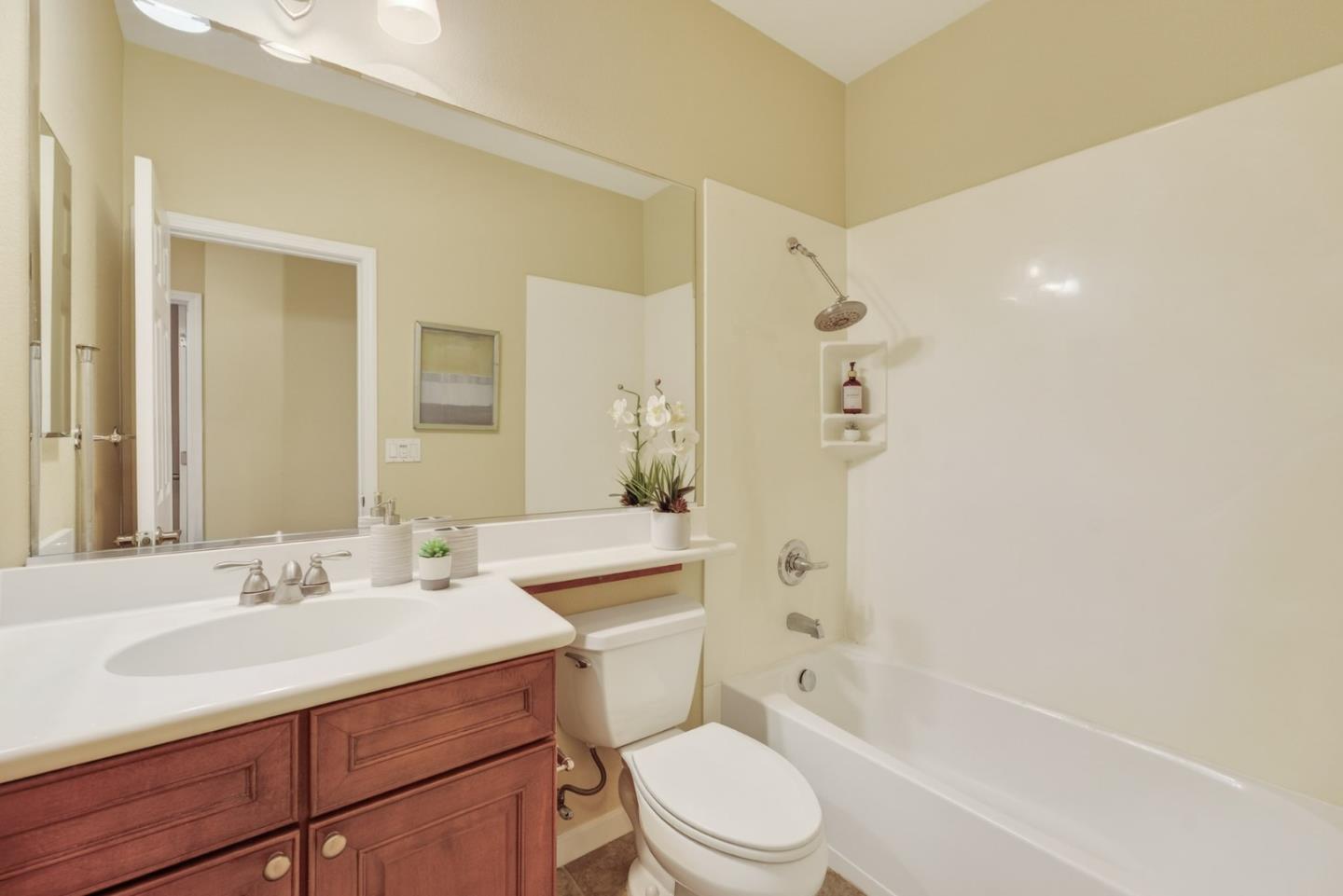 1030 Luz Del Sol Tr Loop Milpitas, CA 95035 - Photo 15 of 26 a bathroom with a sink a toilet and shower