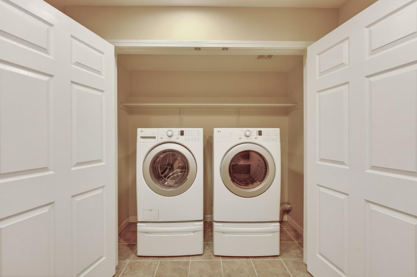 1030 Luz Del Sol Tr Loop Milpitas, CA 95035 - Photo 17 of 26 a utility room with dryer and washer