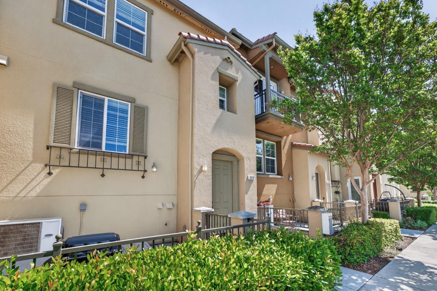 1030 Luz Del Sol Tr Loop Milpitas, CA 95035 - Photo 20 of 26 front view of a house with a small yard
