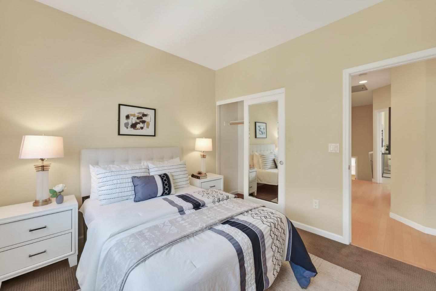 1030 Luz Del Sol Tr Loop Milpitas, CA 95035 - Photo 10 of 26 a bedroom with bed and a night stand