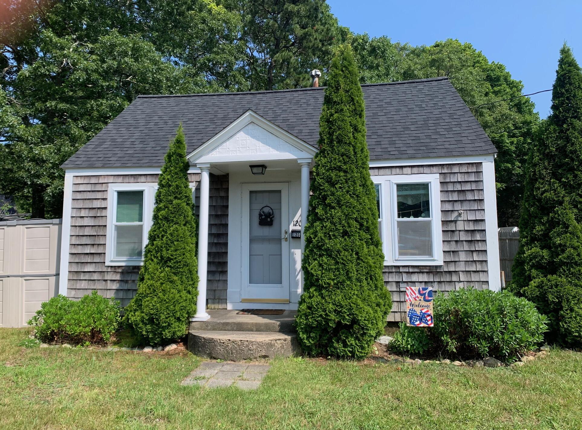 120 Bearses Way Hyannis, MA 02601 - Photo 1 of 11 a front view of a house with a yard