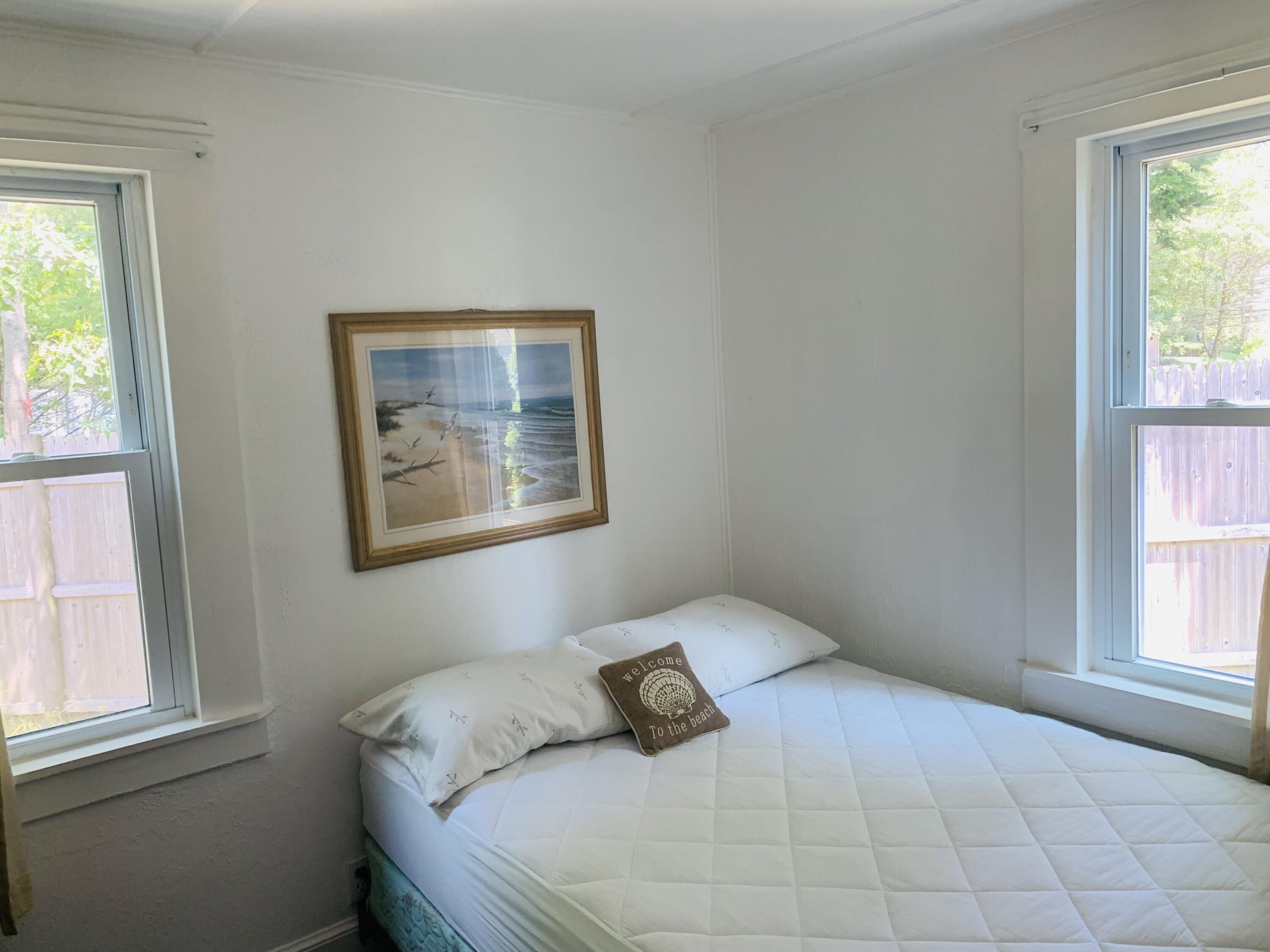 120 Bearses Way Hyannis, MA 02601 - Photo 11 of 11 a bedroom with a bed and a window