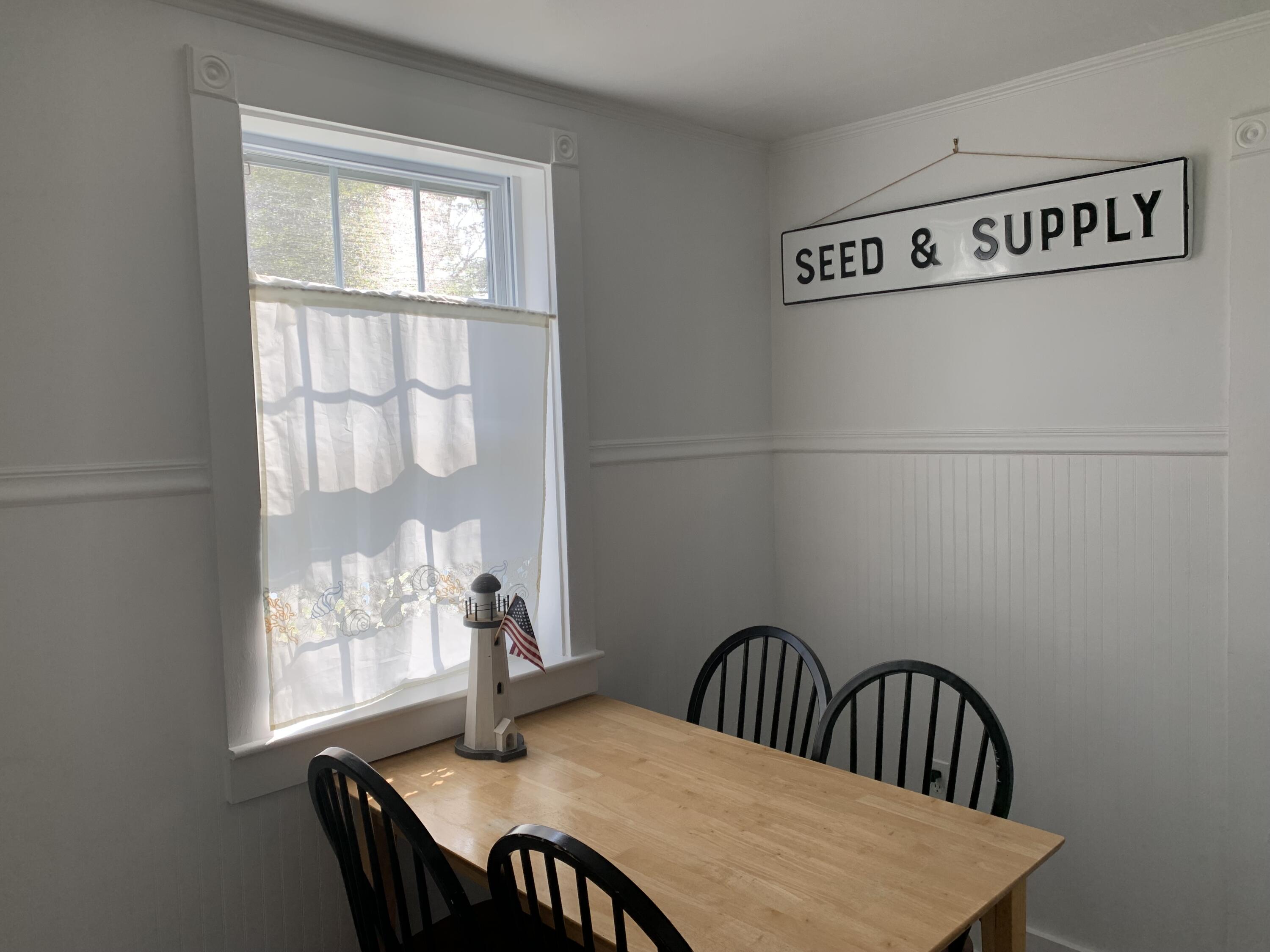 120 Bearses Way Hyannis, MA 02601 - Photo 4 of 11 a view of a dining room with furniture and window