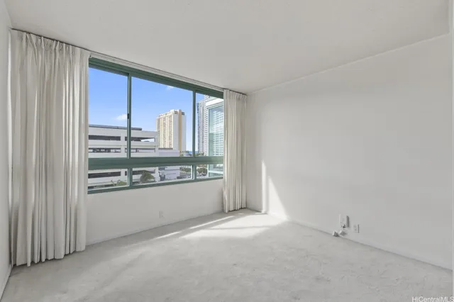 an empty room with a large window