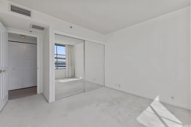 an empty room with shelves