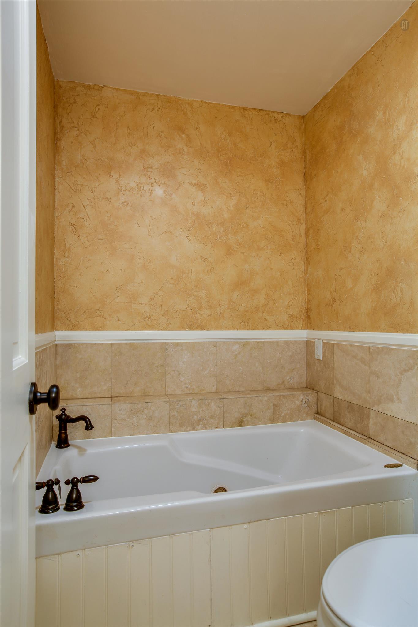 3887 Raleigh-Elam Road Santa Fe, TN 38482 - Photo 17 of 27 The Master Bathroom has Separate Tiled Showed and Jacuzzi Tub