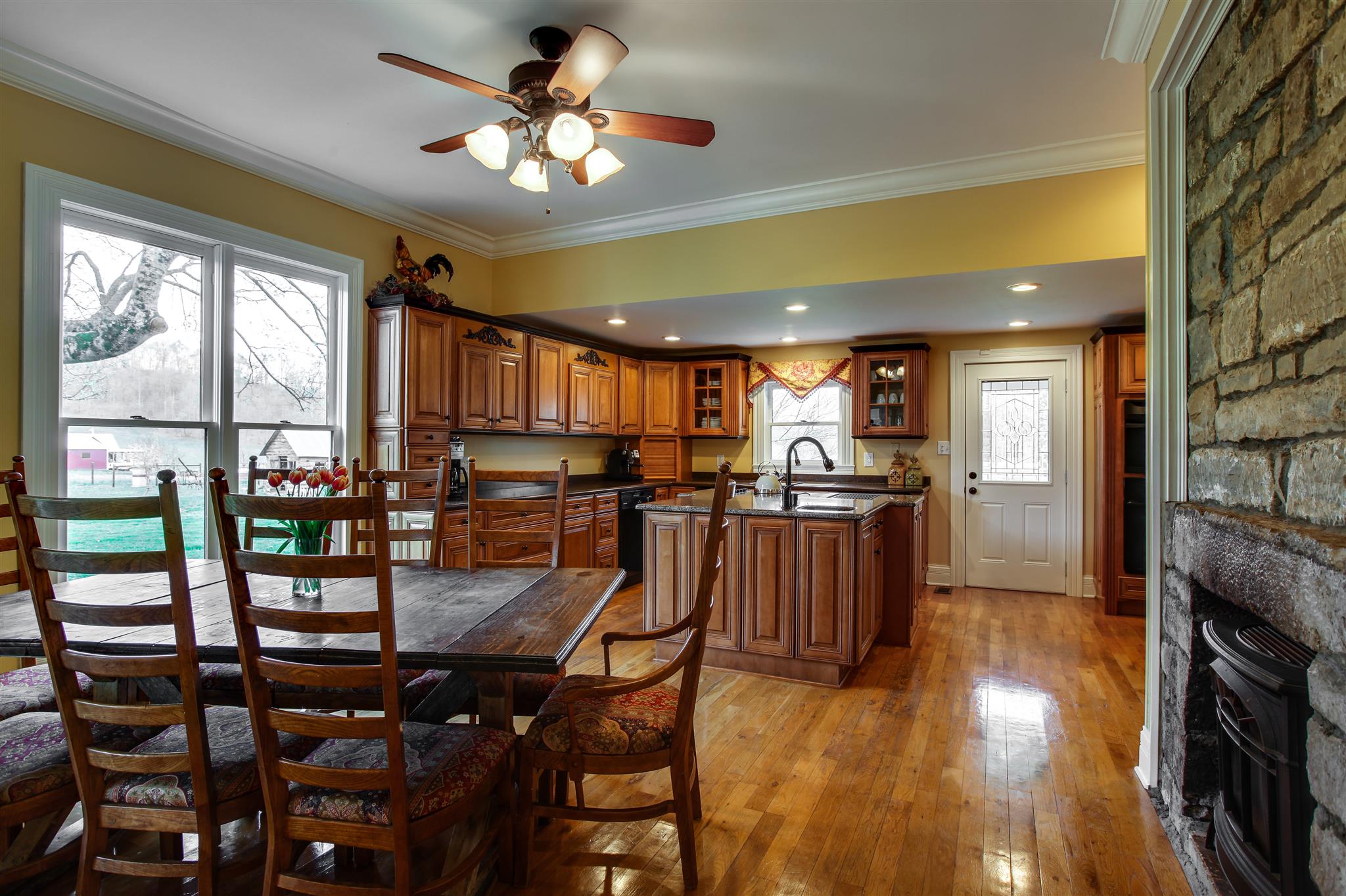 3887 Raleigh-Elam Road Santa Fe, TN 38482 - Photo 10 of 27 This HUGE 22' x 19' Eat In Kitchen has Hardwood Floors & Cabinets and Granite Countertops