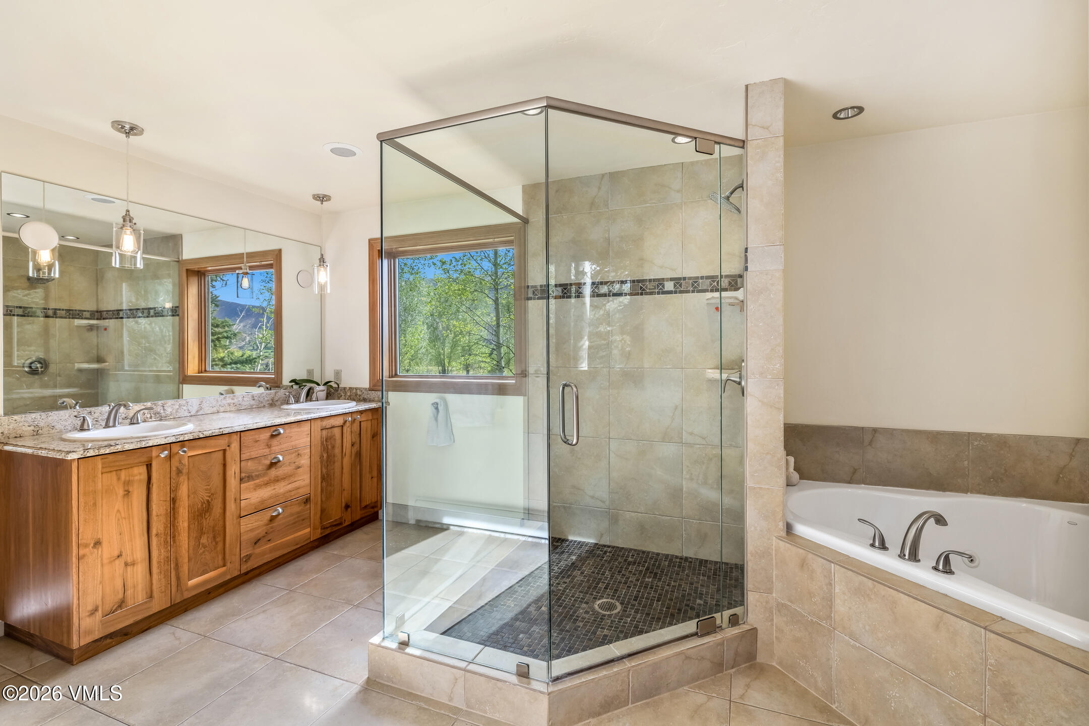 321 Meile Lane Edwards, CO 81632 - Photo 16 of 44 a bathroom with a granite countertop tub shower and sink
