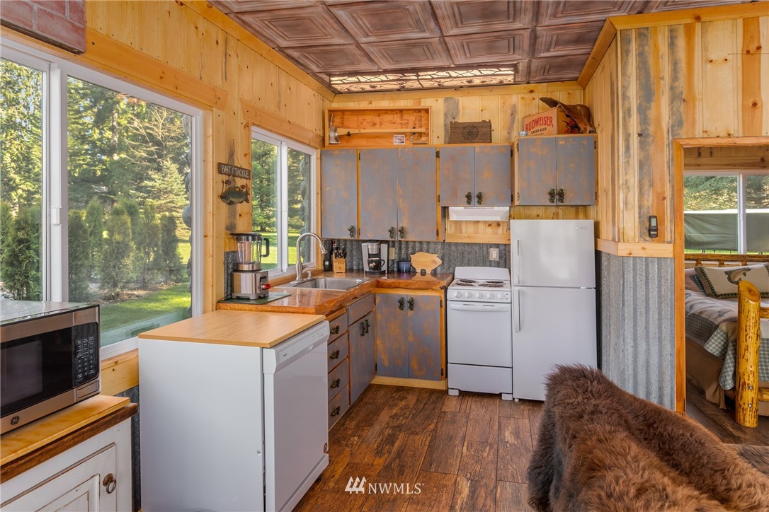 18700 Byers Road Southeast Maple Valley, WA 98038 - Photo 26 of 40 a room with storage and utility