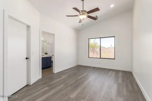 an aerial view of a house with a garden