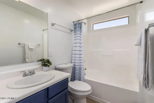 a view of a patio with table and chairs a barbeque