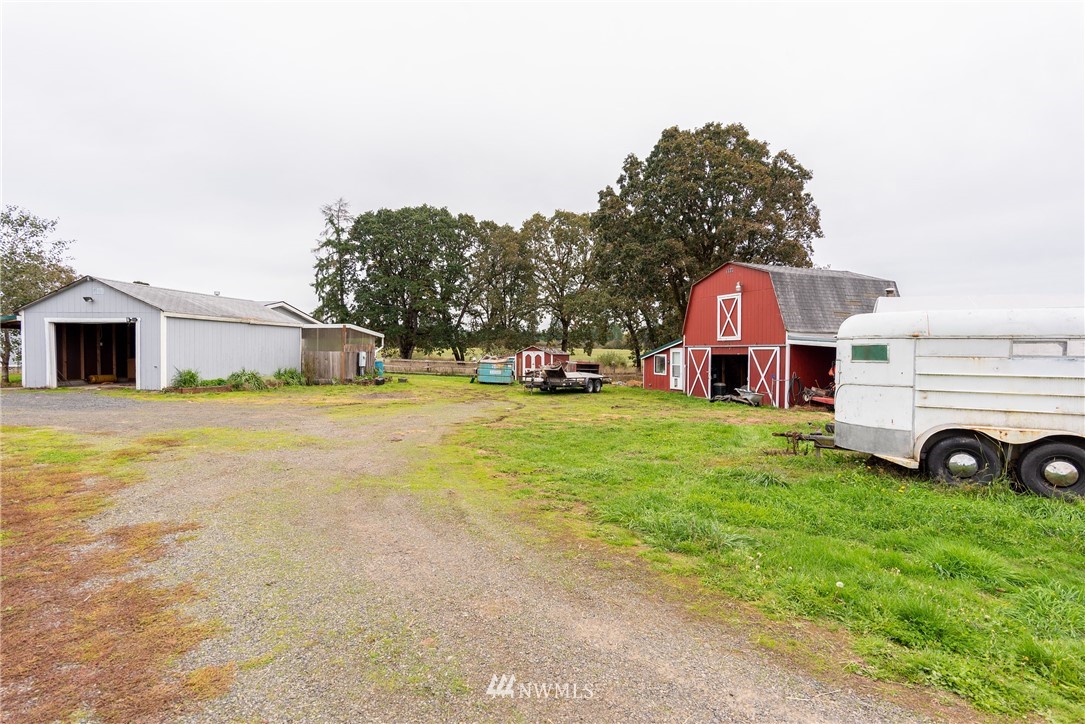 268 Sareault Road Toledo, WA 98591 - Photo 2 of 25 a view of a house with pool and yard