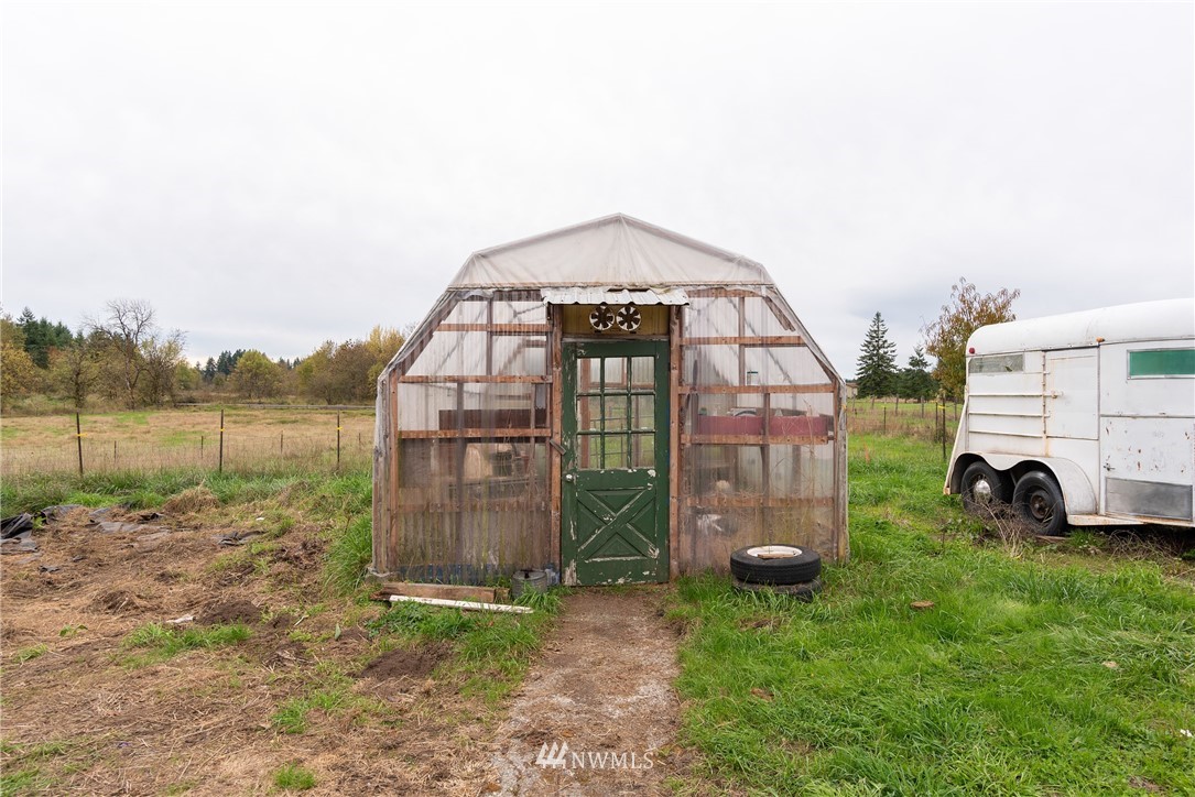 268 Sareault Road Toledo, WA 98591 - Photo 23 of 25 a view of a tiny house with a yard