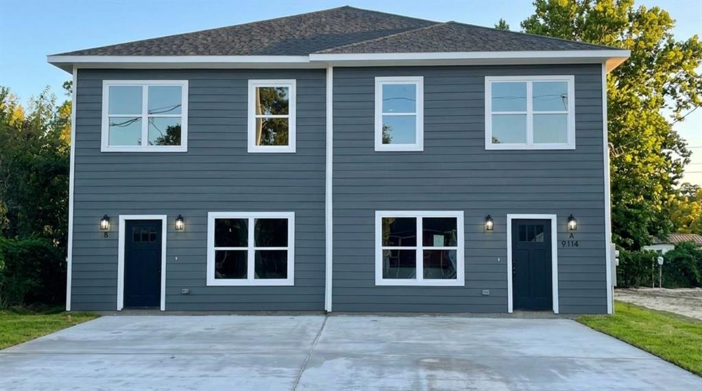 9114 Caddo Road, Unit A & B Houston, TX 77078 - Photo 1 of 24 Modern duplex exterior featuring horizontal siding in a dark gray finish